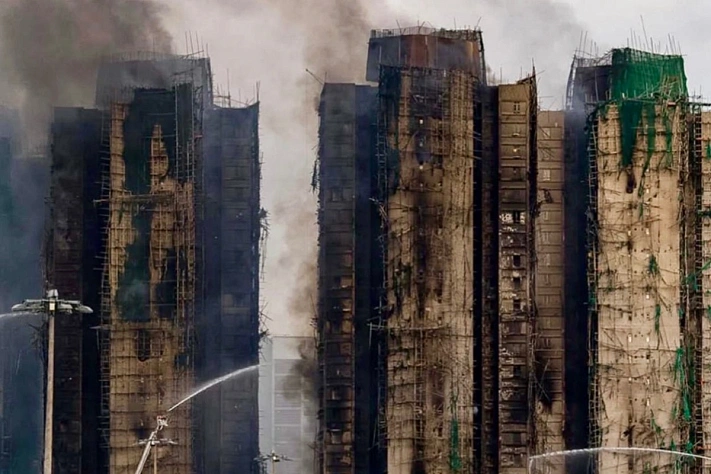 Число погибших в пожаре в Гонконге достигло 128 человек